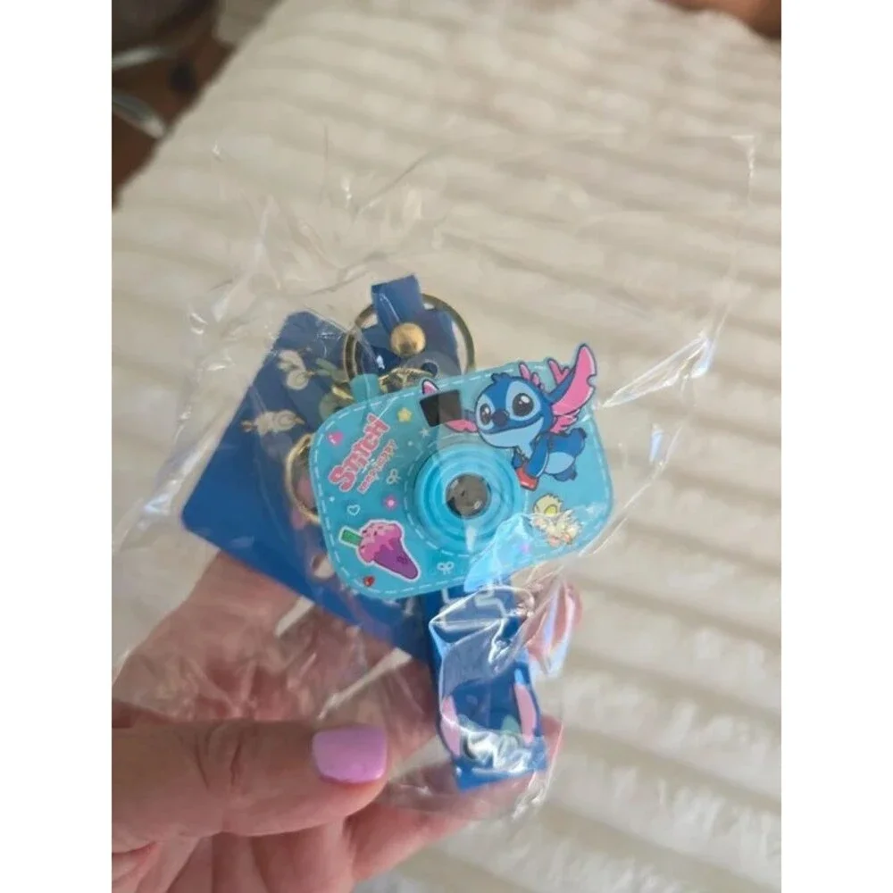 Blue Stitch camera keychain with wrist strap